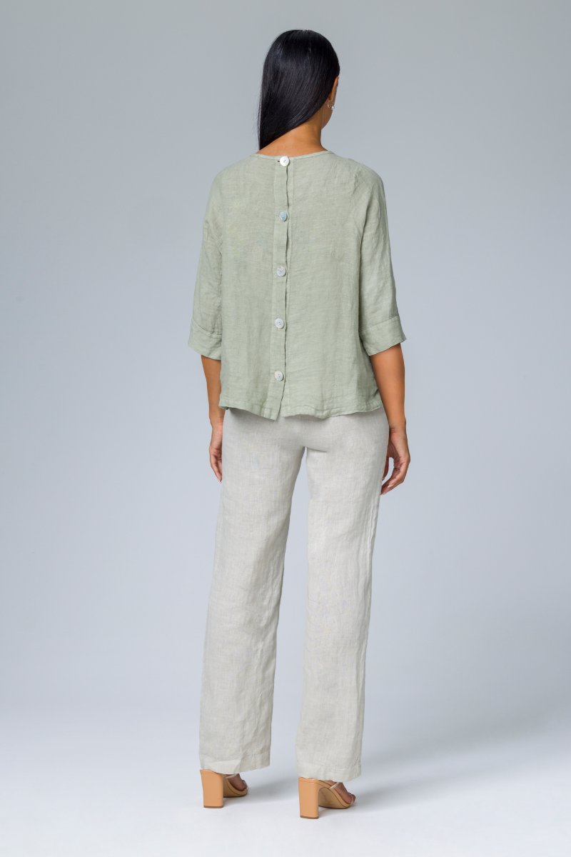 Blusa con bottoni dietro