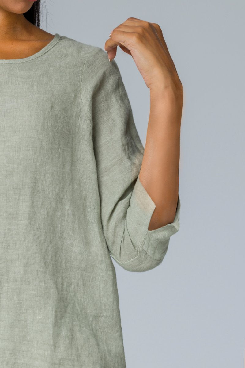 Blusa con bottoni dietro