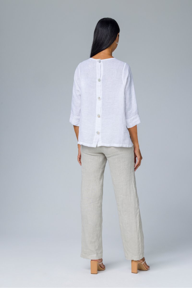 Blusa con bottoni dietro