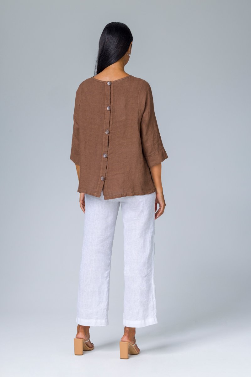 Blusa con bottoni dietro