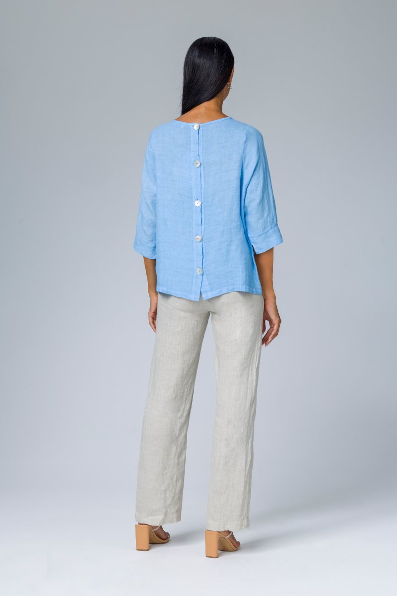 Blusa con bottoni dietro