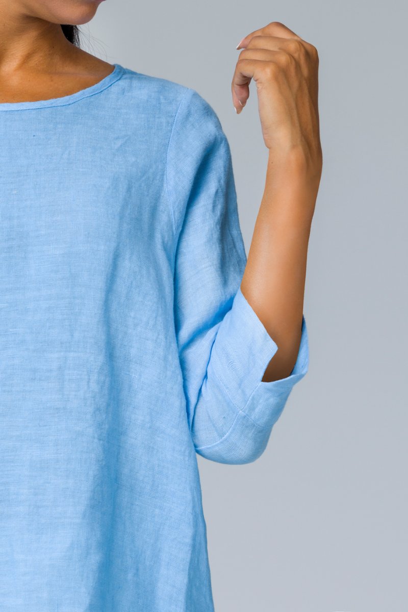Blusa con bottoni dietro