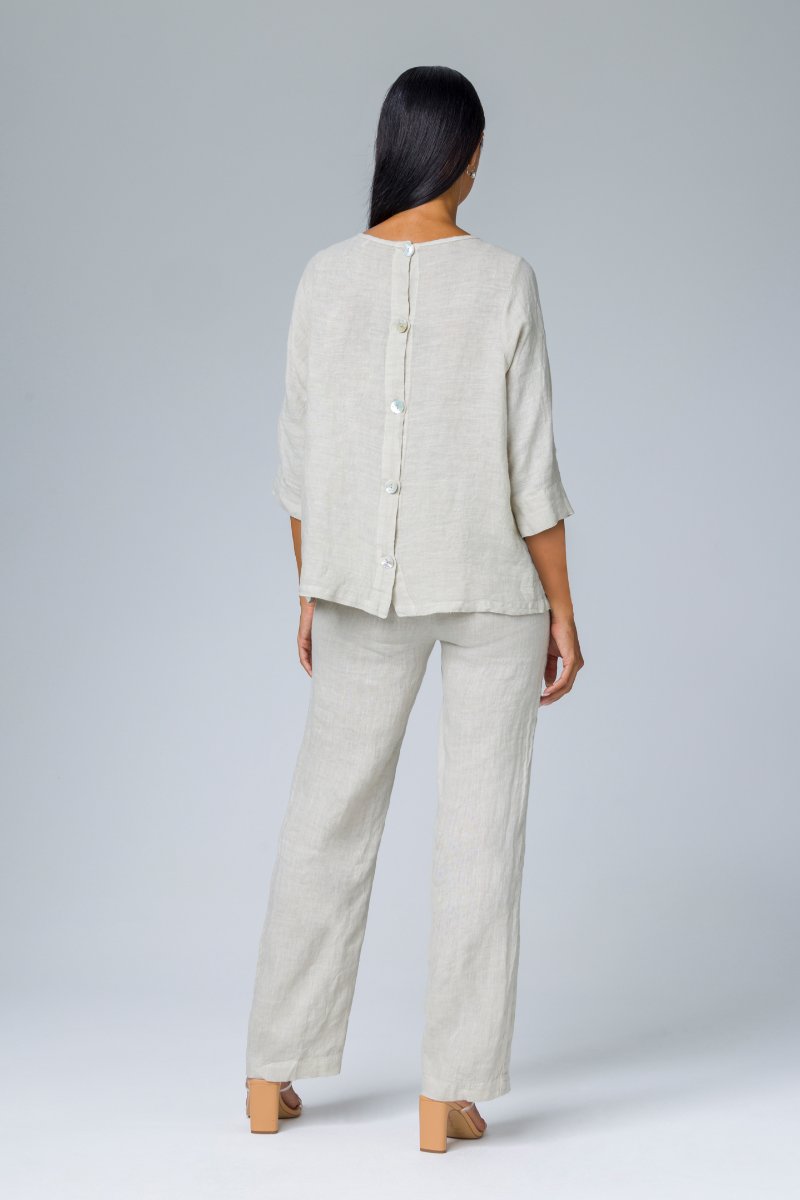 Blusa con bottoni dietro