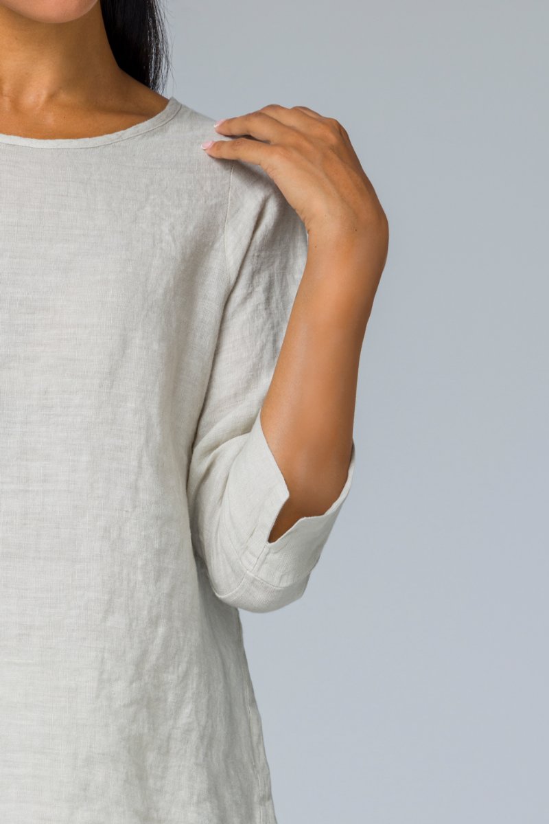 Blusa con bottoni dietro