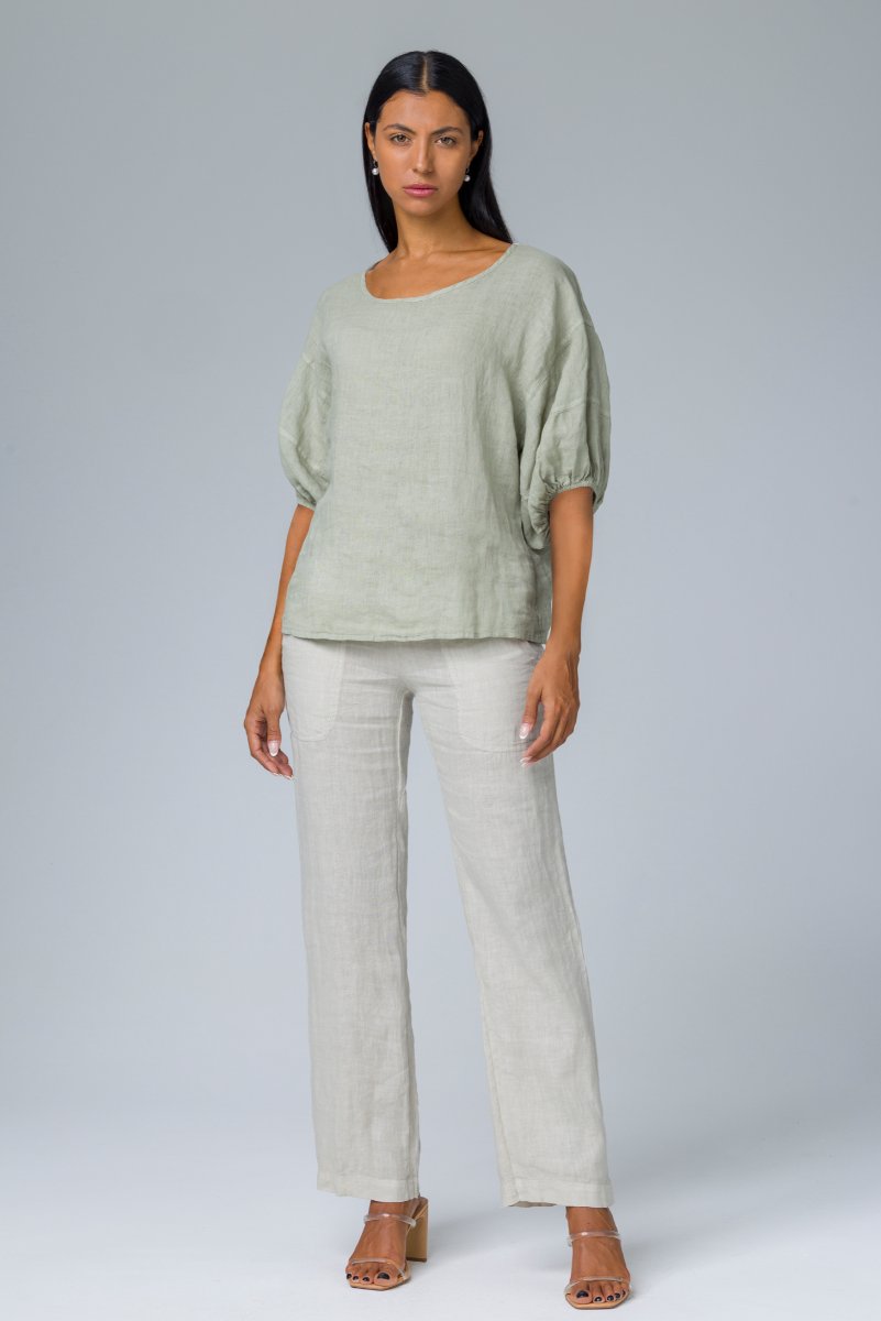 Blusa con maniche a sbuffo