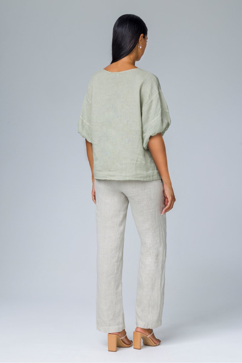 Blusa con maniche a sbuffo