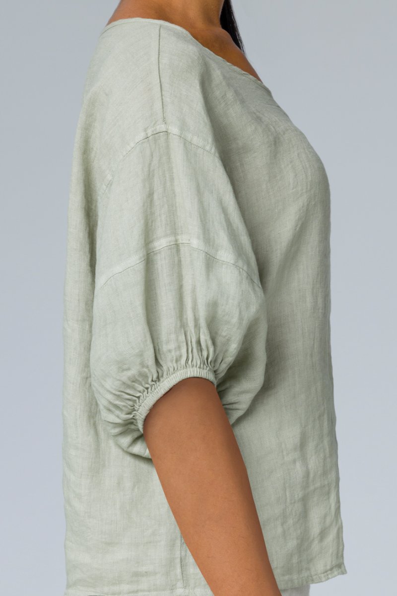 Blusa con maniche a sbuffo