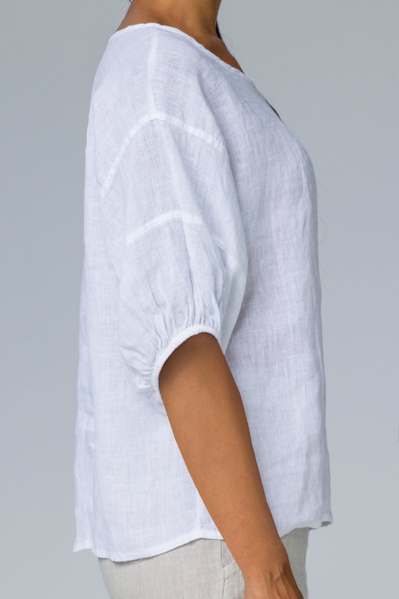 Blusa con maniche a sbuffo